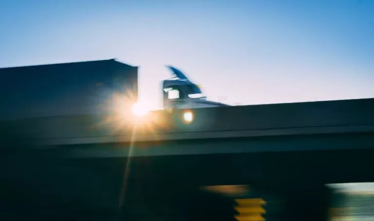 commercial 18 wheeler semi truck on highway