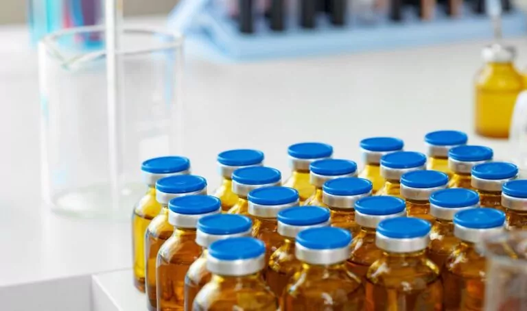 glass bottles of medication for distribution
