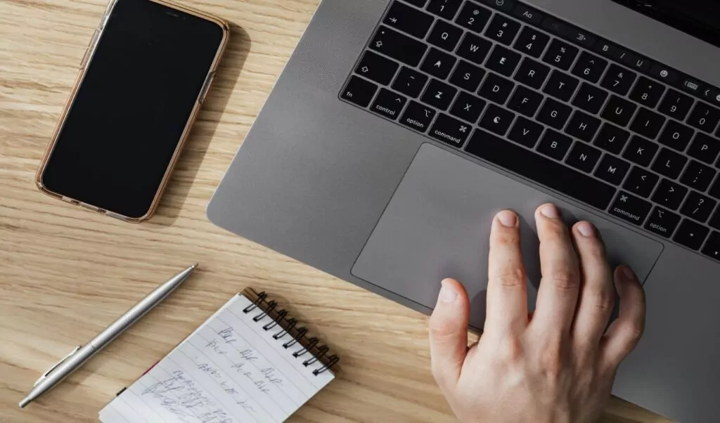 Computer, Phone and Notepad