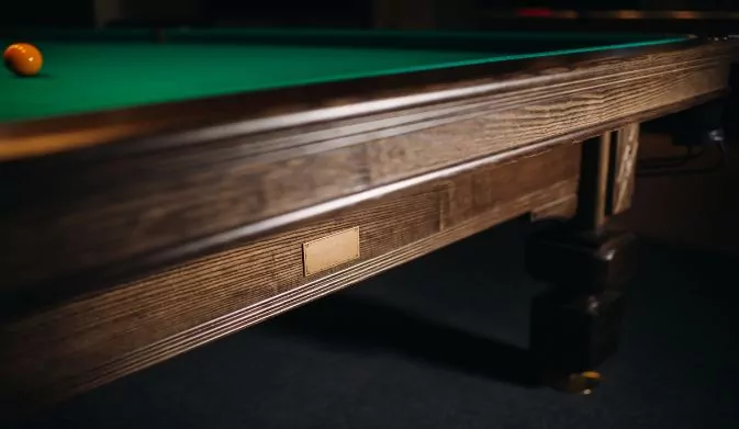 oak decorative leg of a billiard table