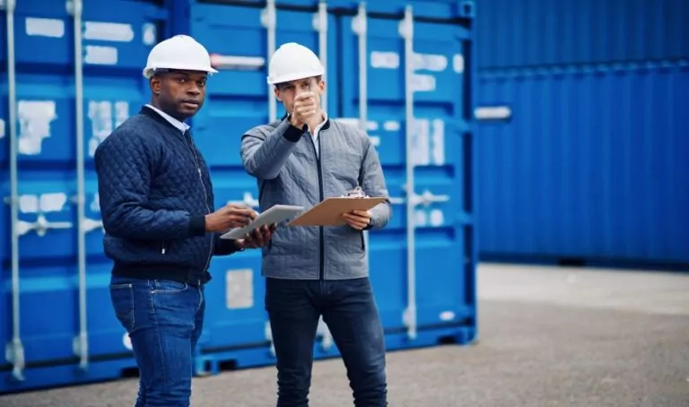 engineers discussing freight logistics